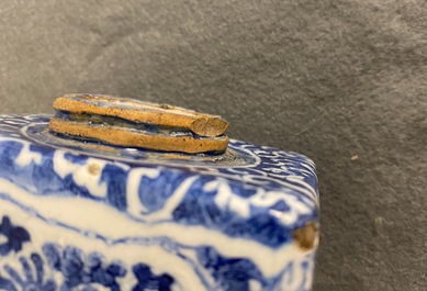 A rectangular Dutch Delft blue and white tea caddy with floral design, late 17th C.